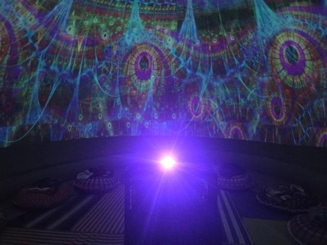 A mandala projected overhead